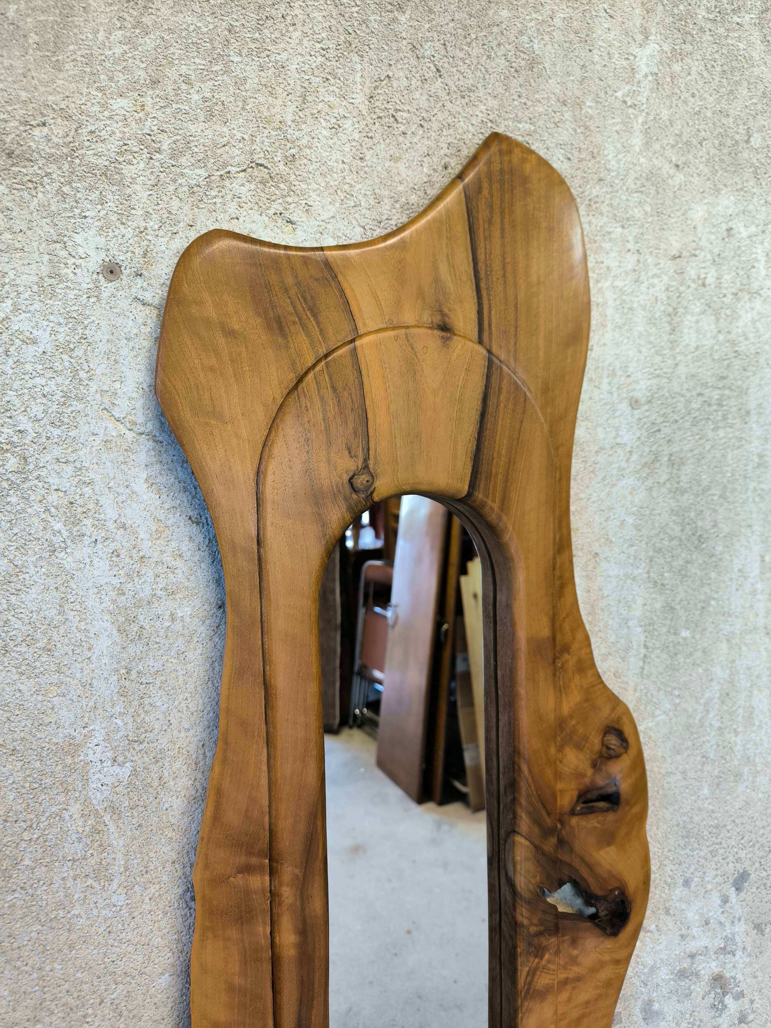 Vintage free-form mirror in solid wood.