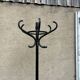 Black parrot coat rack