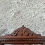 Set of two bevelled mirrors in moulded oak.