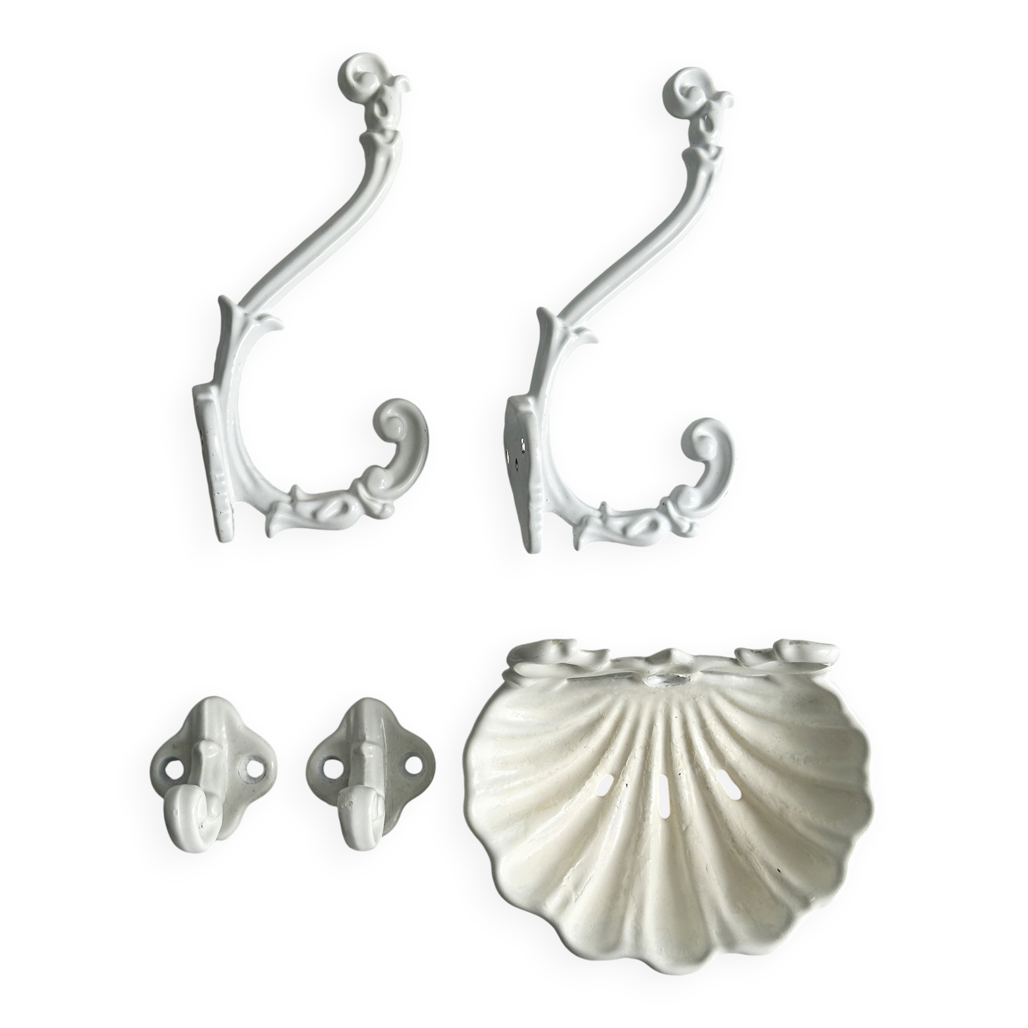 Bathroom décor, hooks, soap dish, white metal hangers.