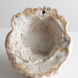 Lion's head in painted plaster