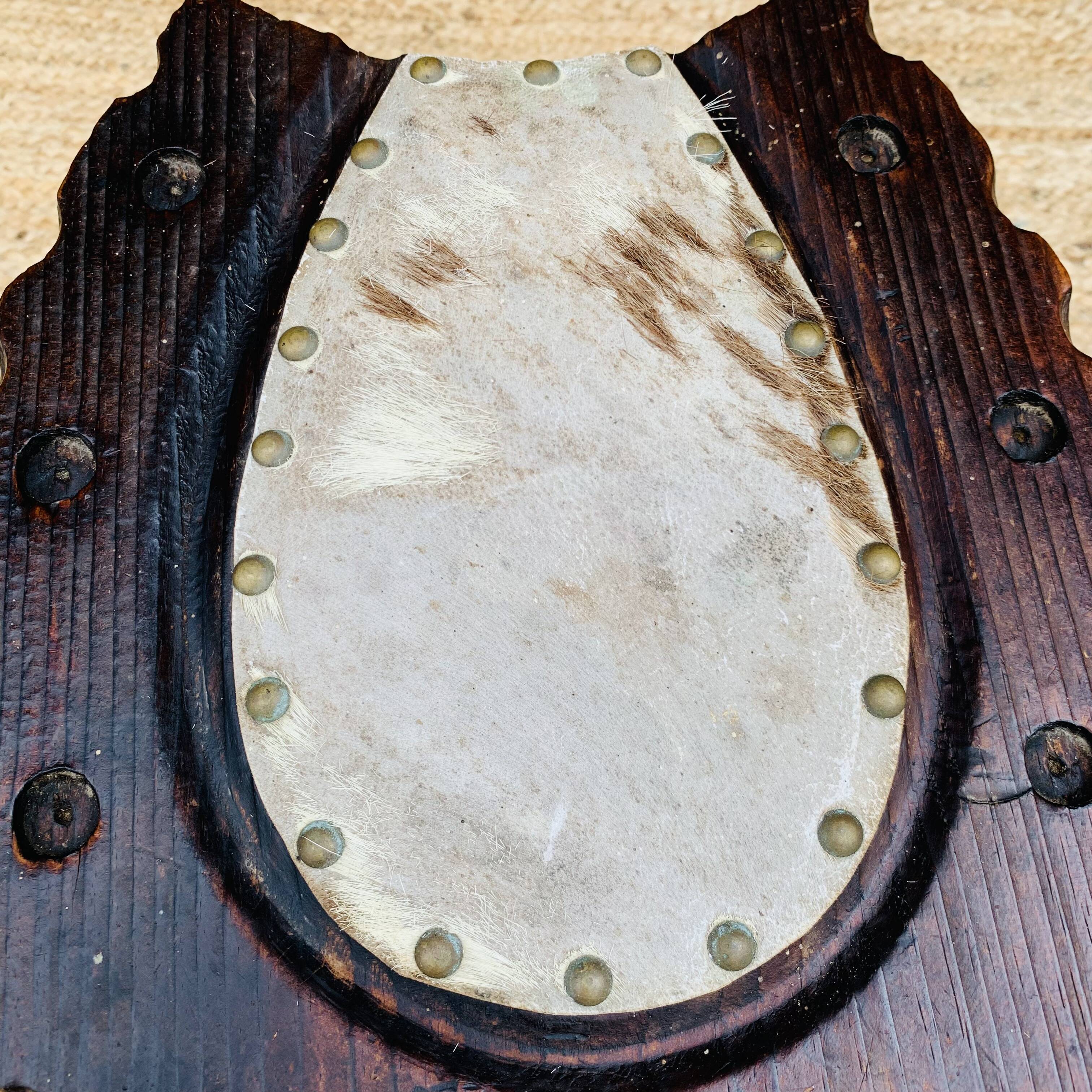Wooden horseshoe stool
