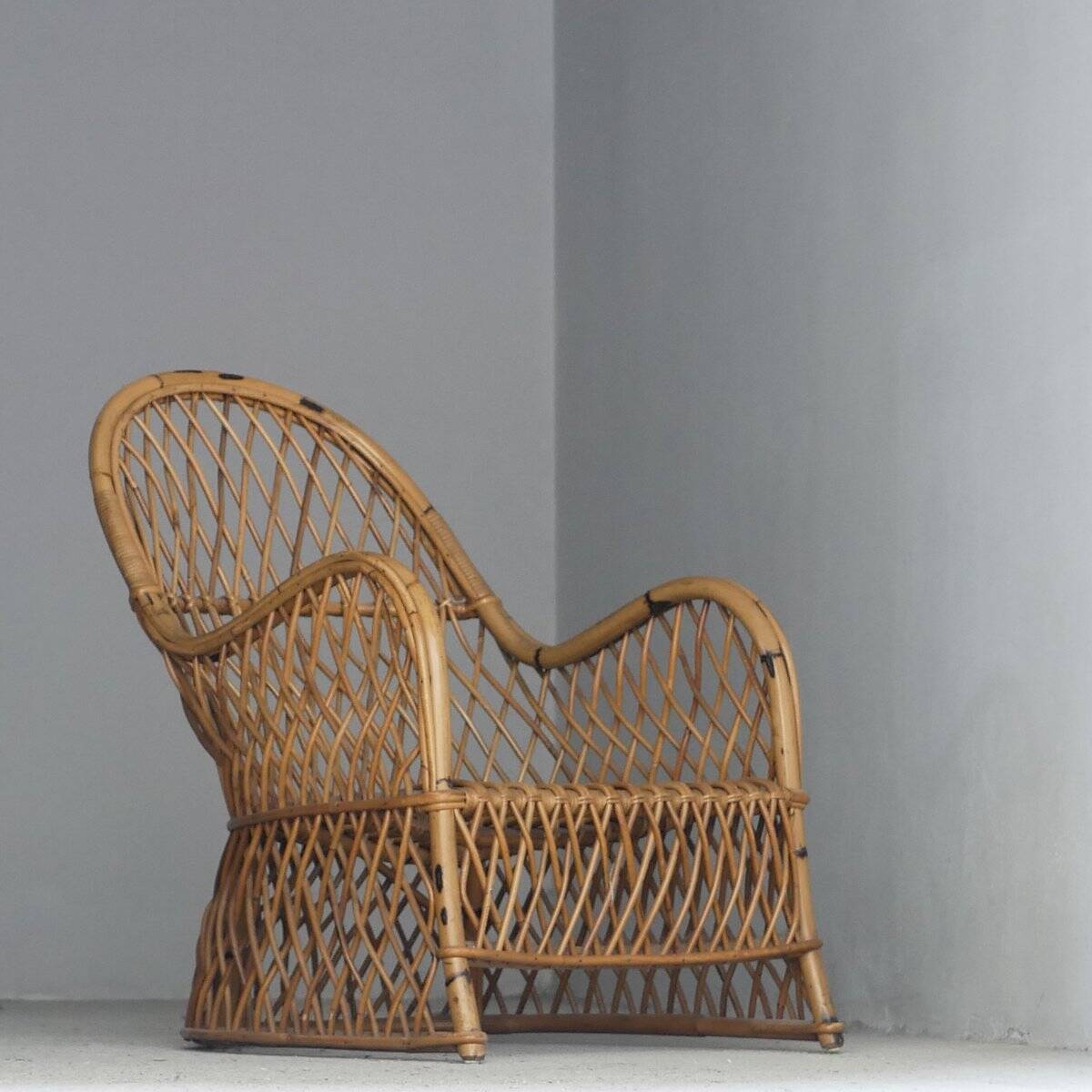 Fauteuil en rotin Gervasoni, années 1960