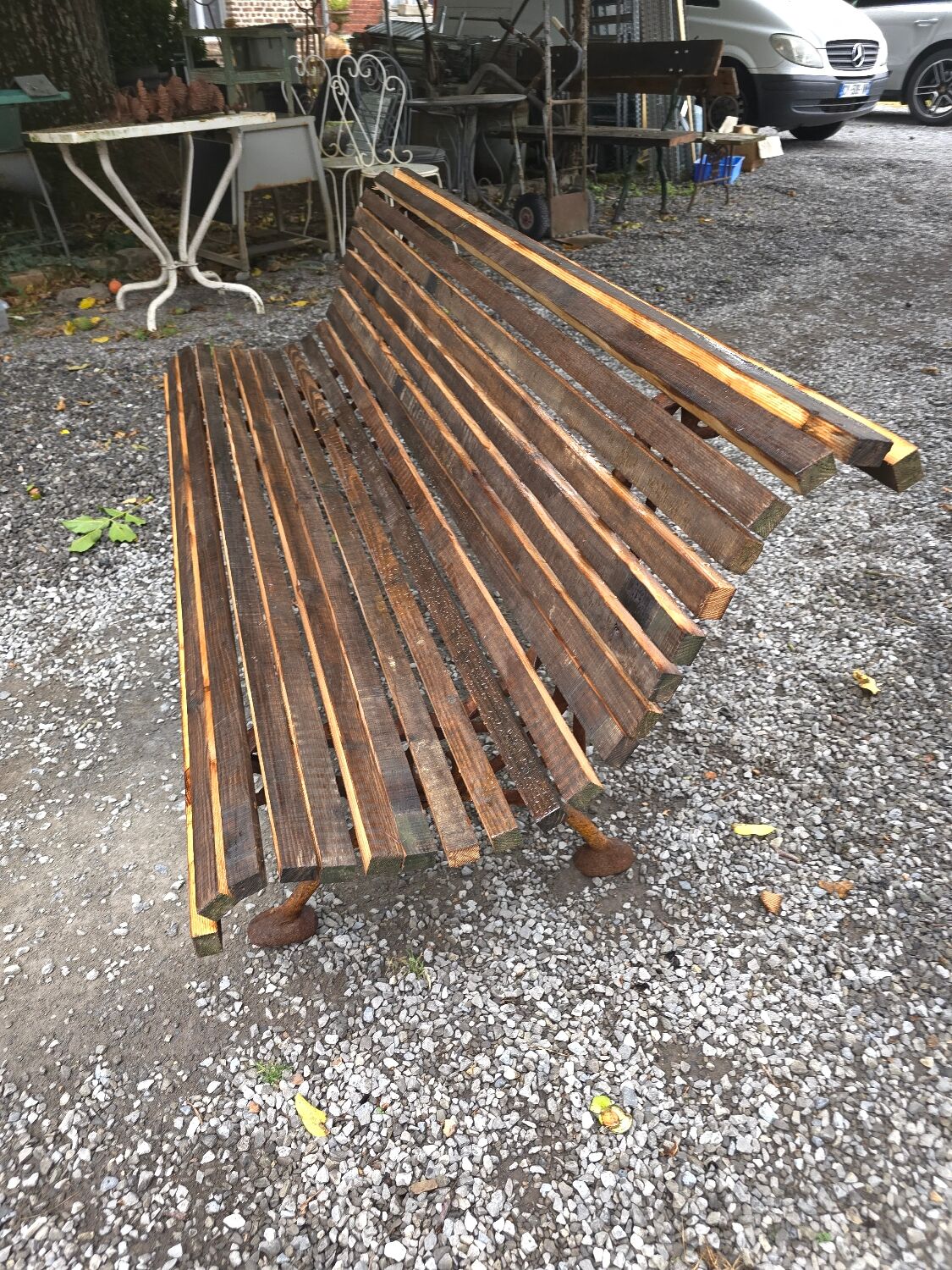 Cast iron garden bench with wooden slats