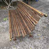 Cast iron garden bench with wooden slats