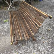 Cast iron garden bench with wooden slats