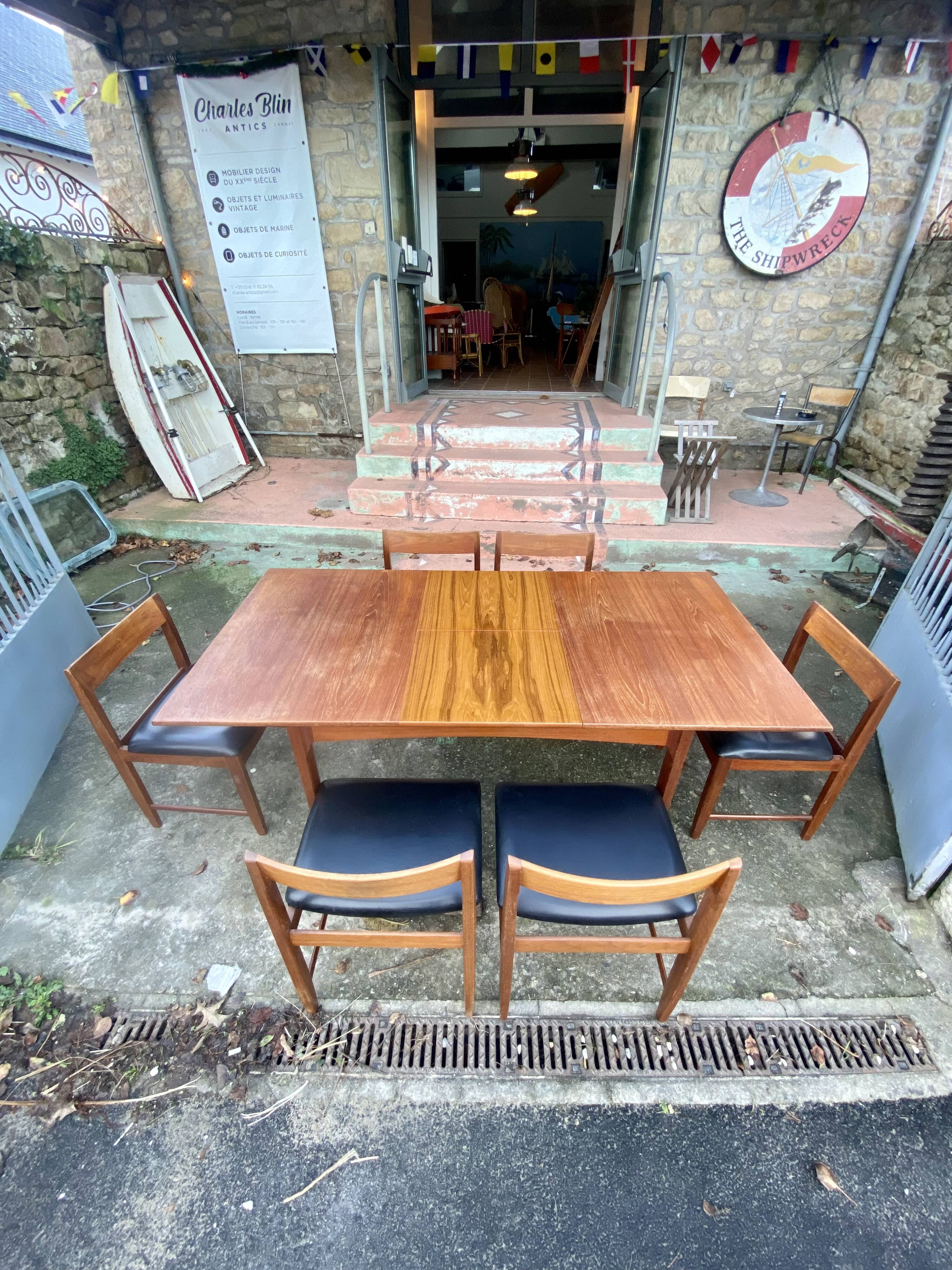 Set of 6 chairs and dining room table with extensions “BCM” circa 1960