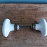 White porcelain door knob handles