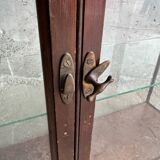 Dark-stained wood and glass vintage display cabinet — early 20th-century wall-mounted showcase