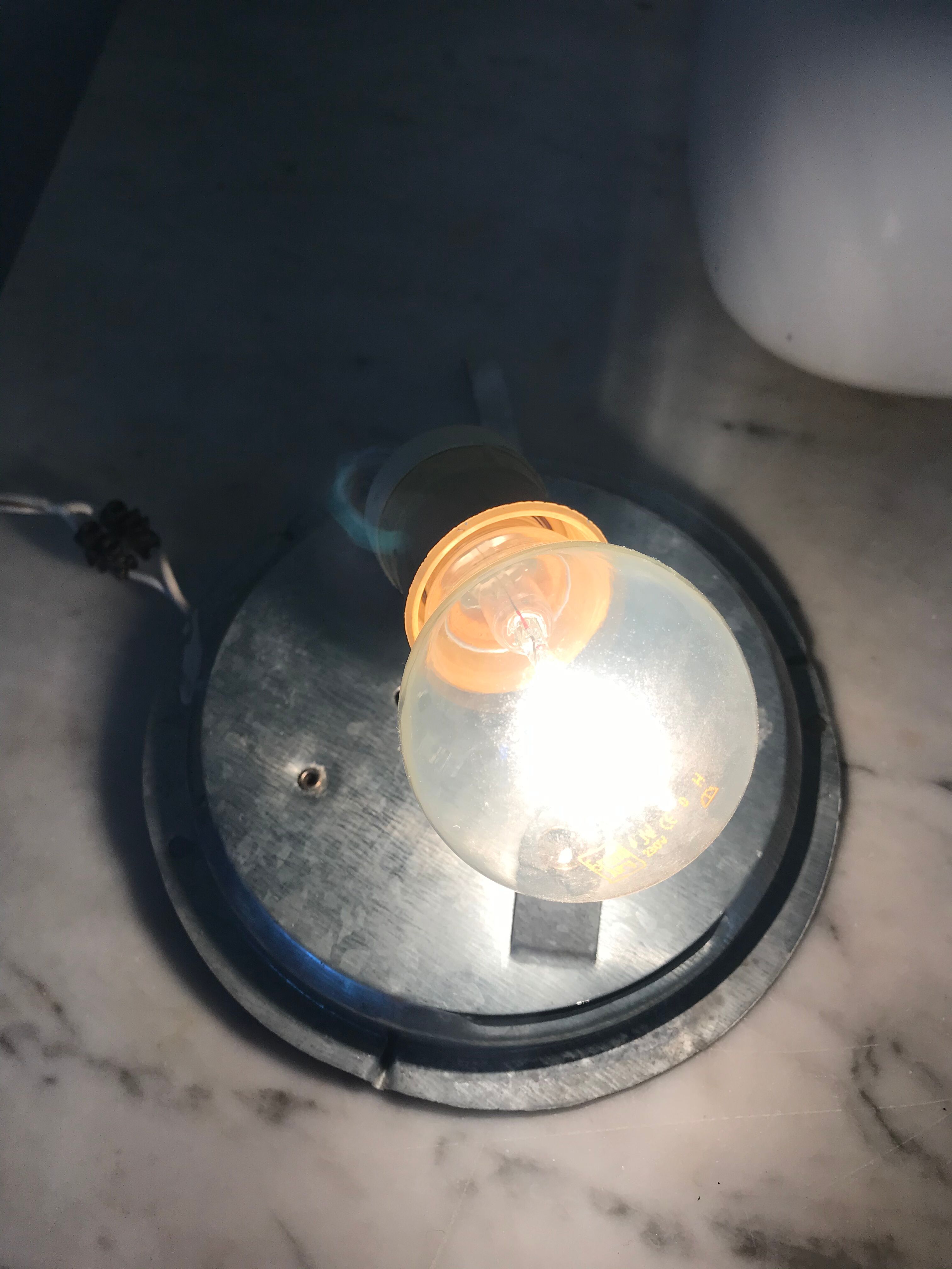 Sconce in vintage opaline