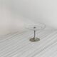 Bowl on a foot in worked glass and elegant metal