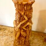 Two ancient Indonesian candlesticks.