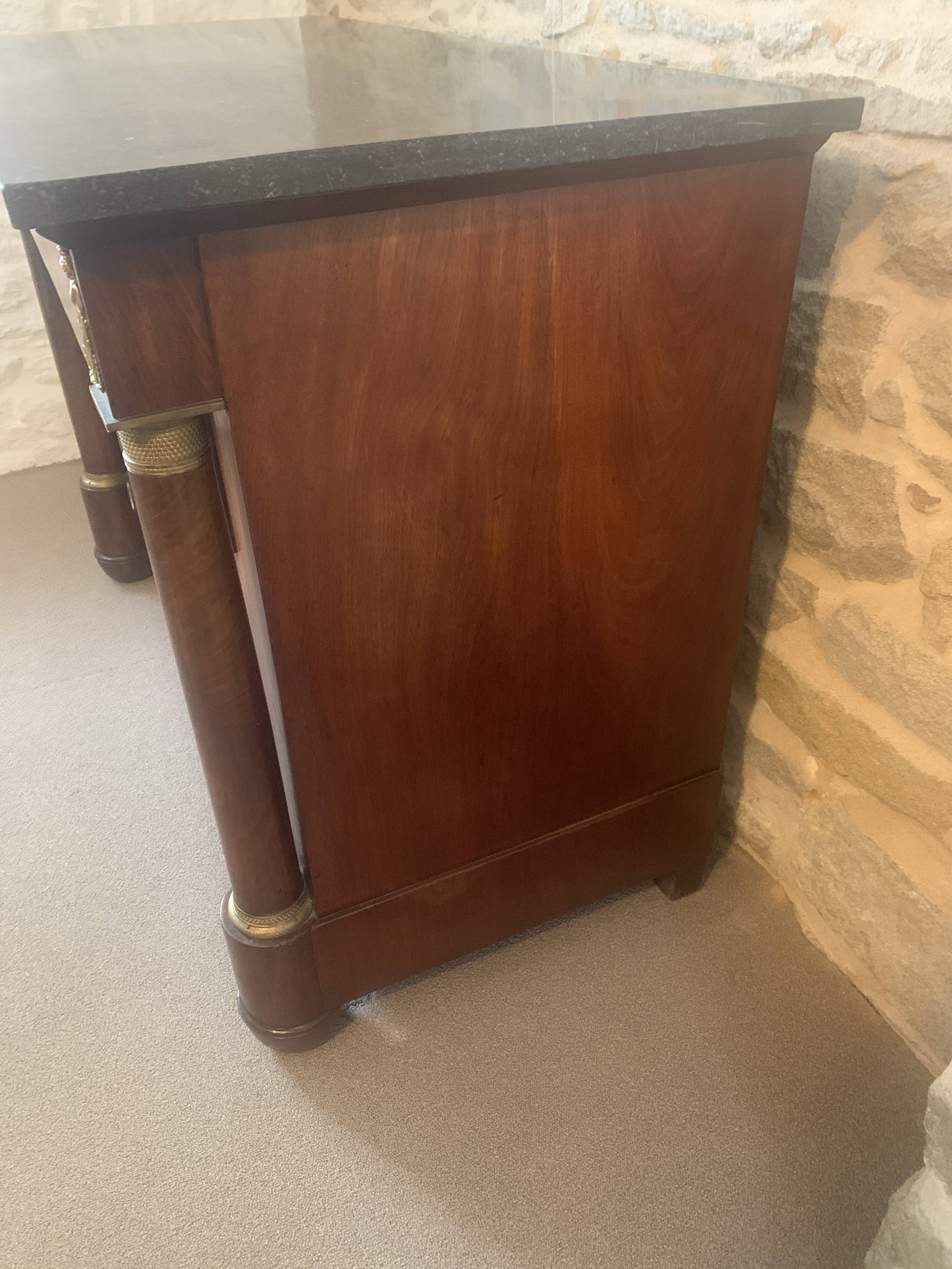Empire chest of drawers with columns, 19th century mahogany