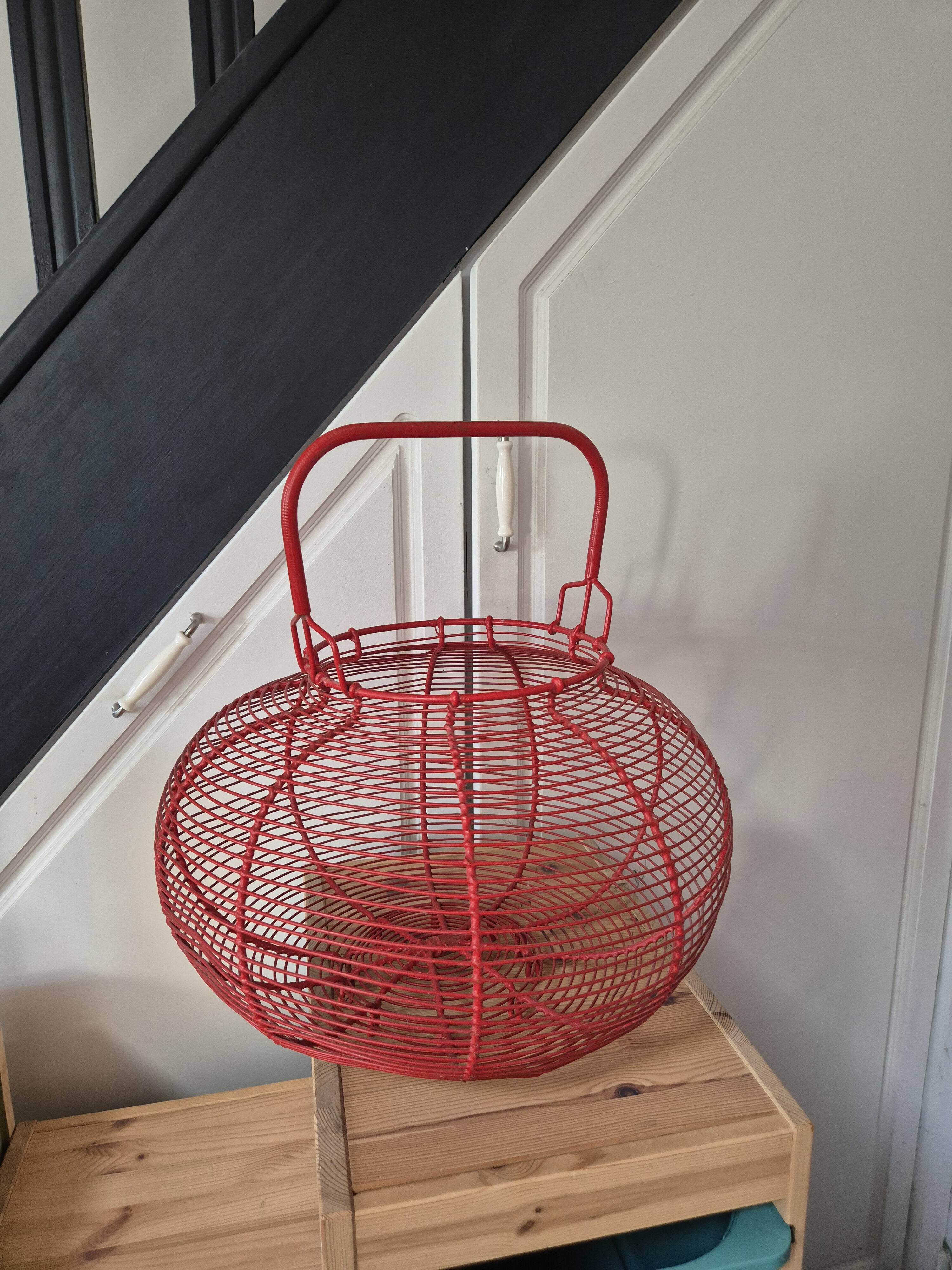 very large vintage red metal basket with handle
