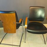 Chairs in leather, walnut and chrome