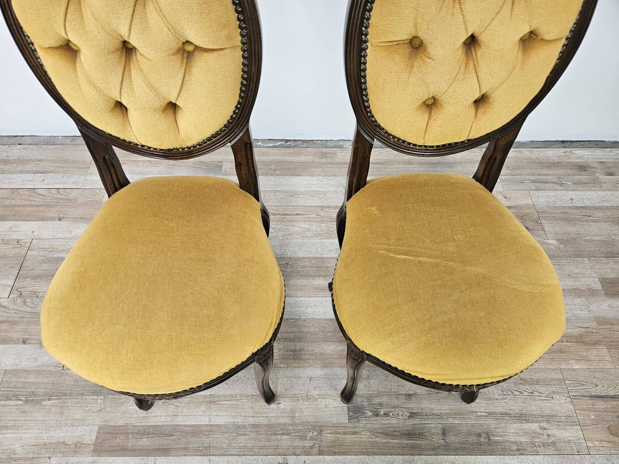 Pair of early 1900s wooden chairs with padded seat and backrests
