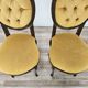 Pair of early 1900s wooden chairs with padded seat and backrests