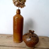 Vase pique fleurs en grès signé