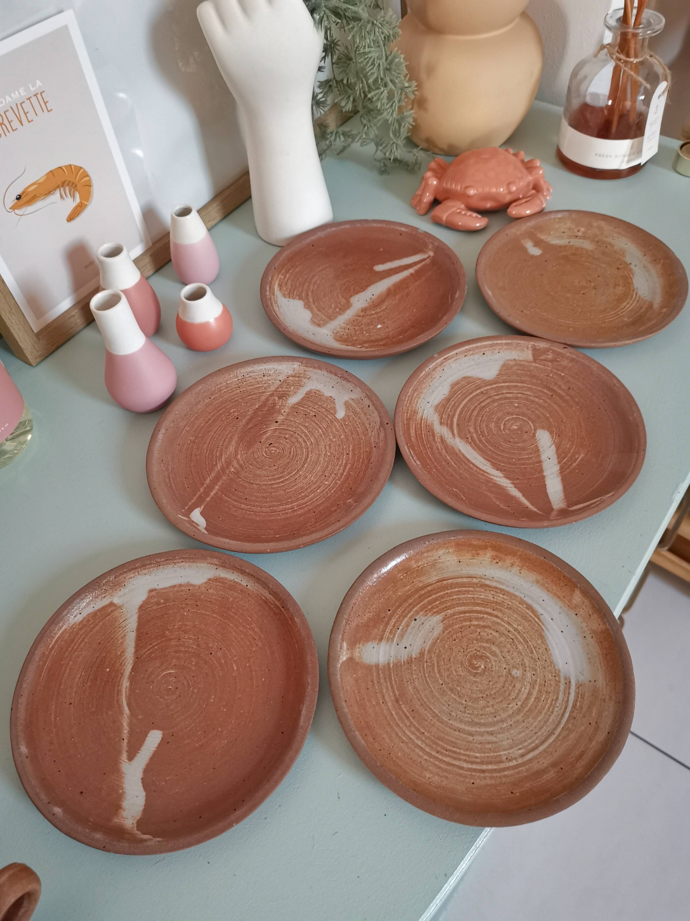 Set of vintage stoneware cups and saucers