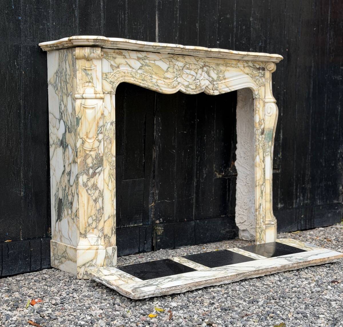 Louis XV style fireplace in purple breccia marble, circa 1880