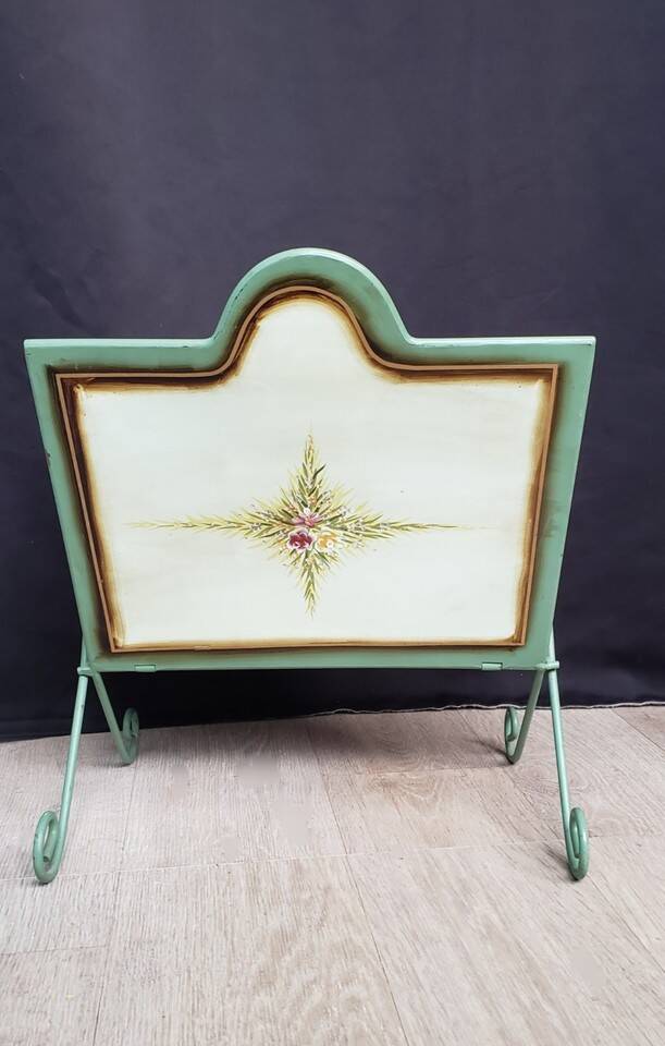 Vintage magazine rack in painted sheet metal