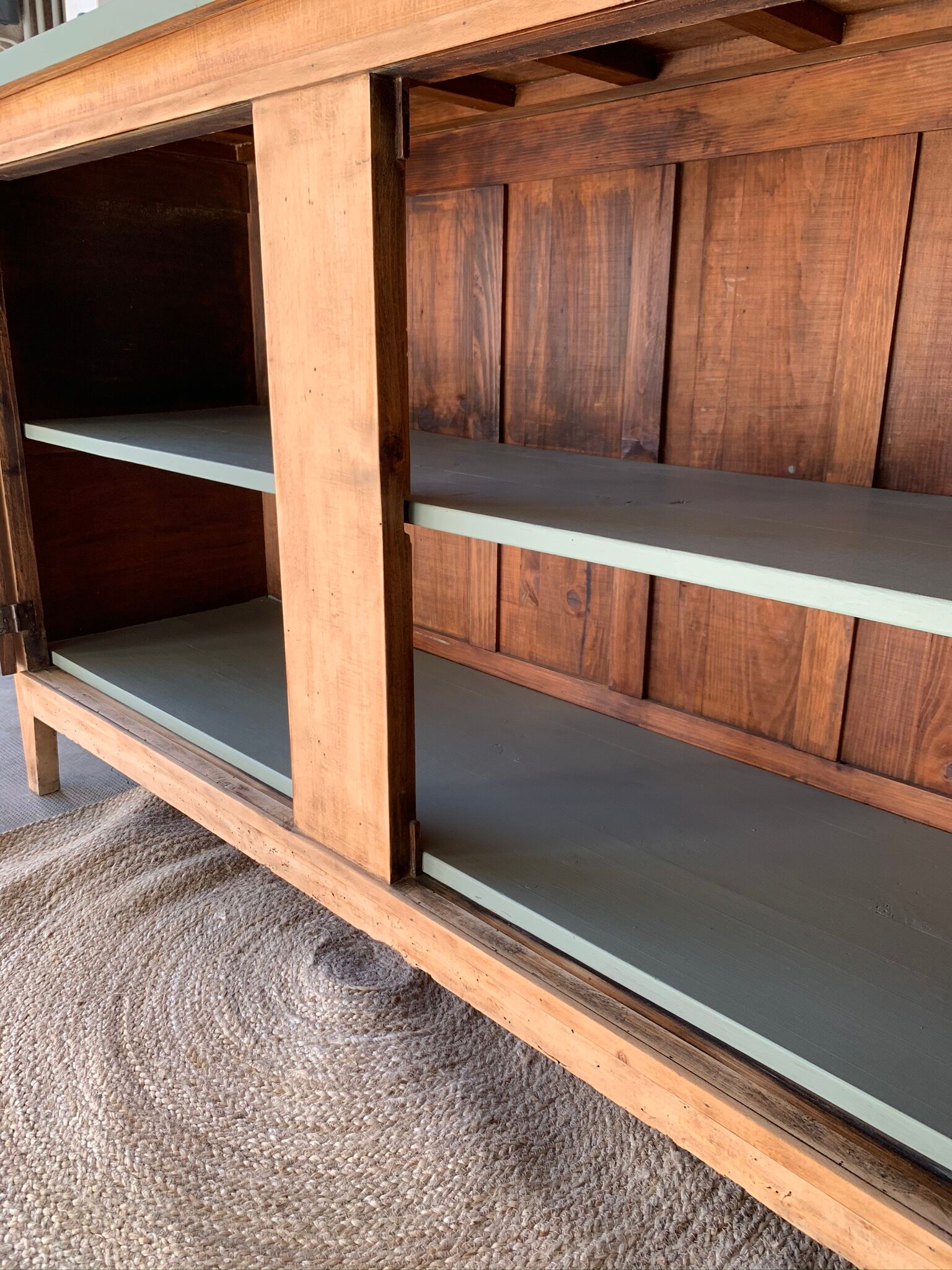 Green buffet and raw wood