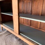 Green buffet and raw wood