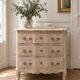 Beautifully crafted Louis XVI style commode in bleached wood.