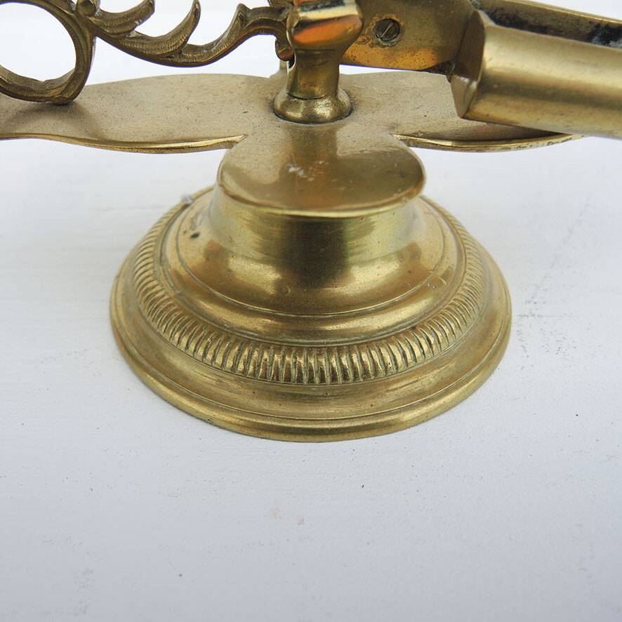 Antique 2-light candelabrum with scissors in bronze or brass.