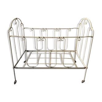 Old white wrought iron folding bed / seat