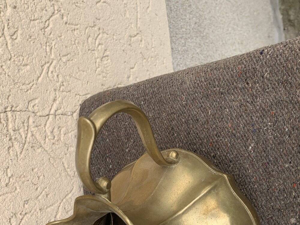 Vintage brass pitcher with "petal" patterns — decorative S-shaped handle, 1950s.