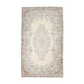 Tapis floral beige et marron fait à la main