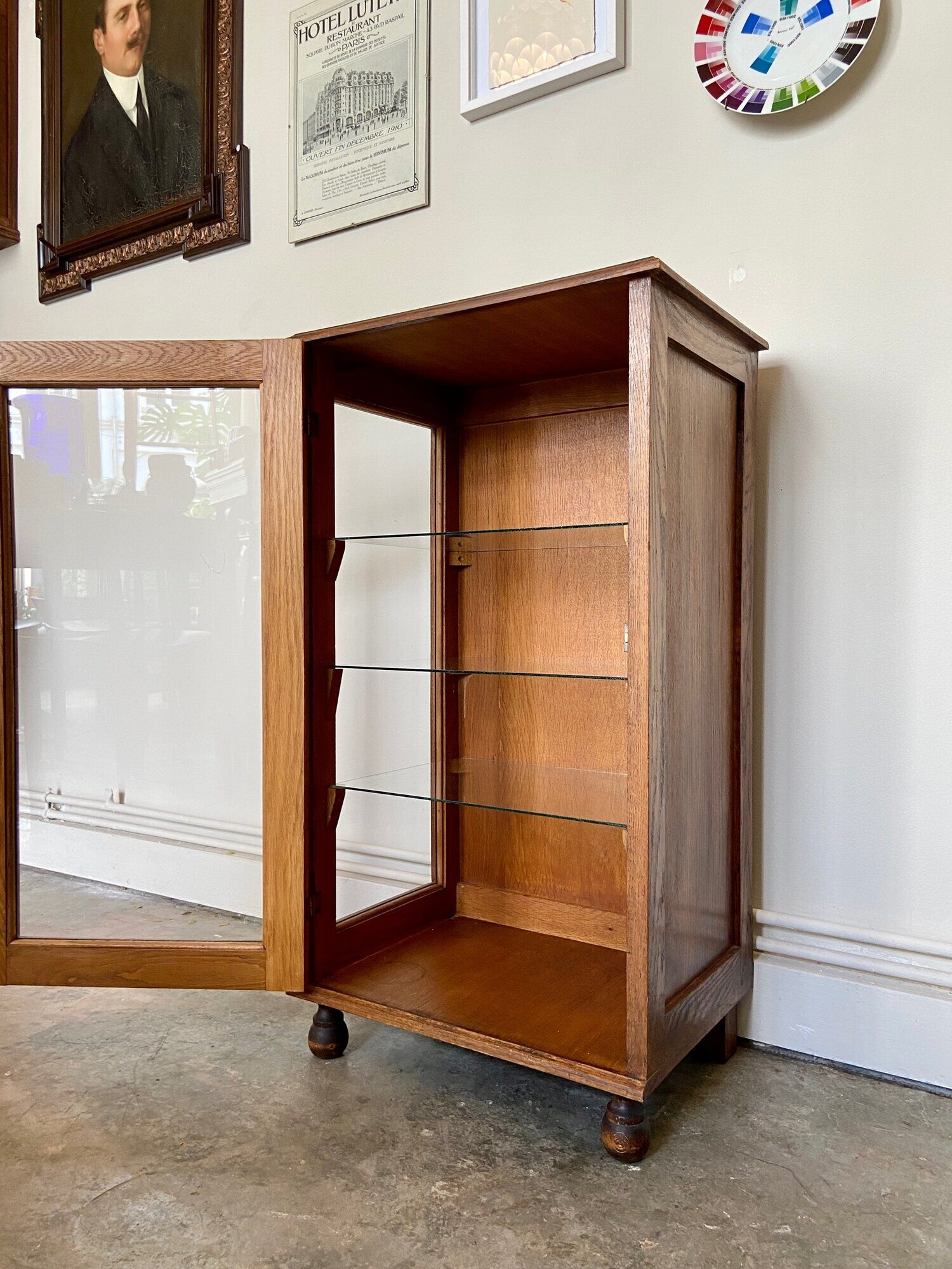 Dark wood display case and transparent glass