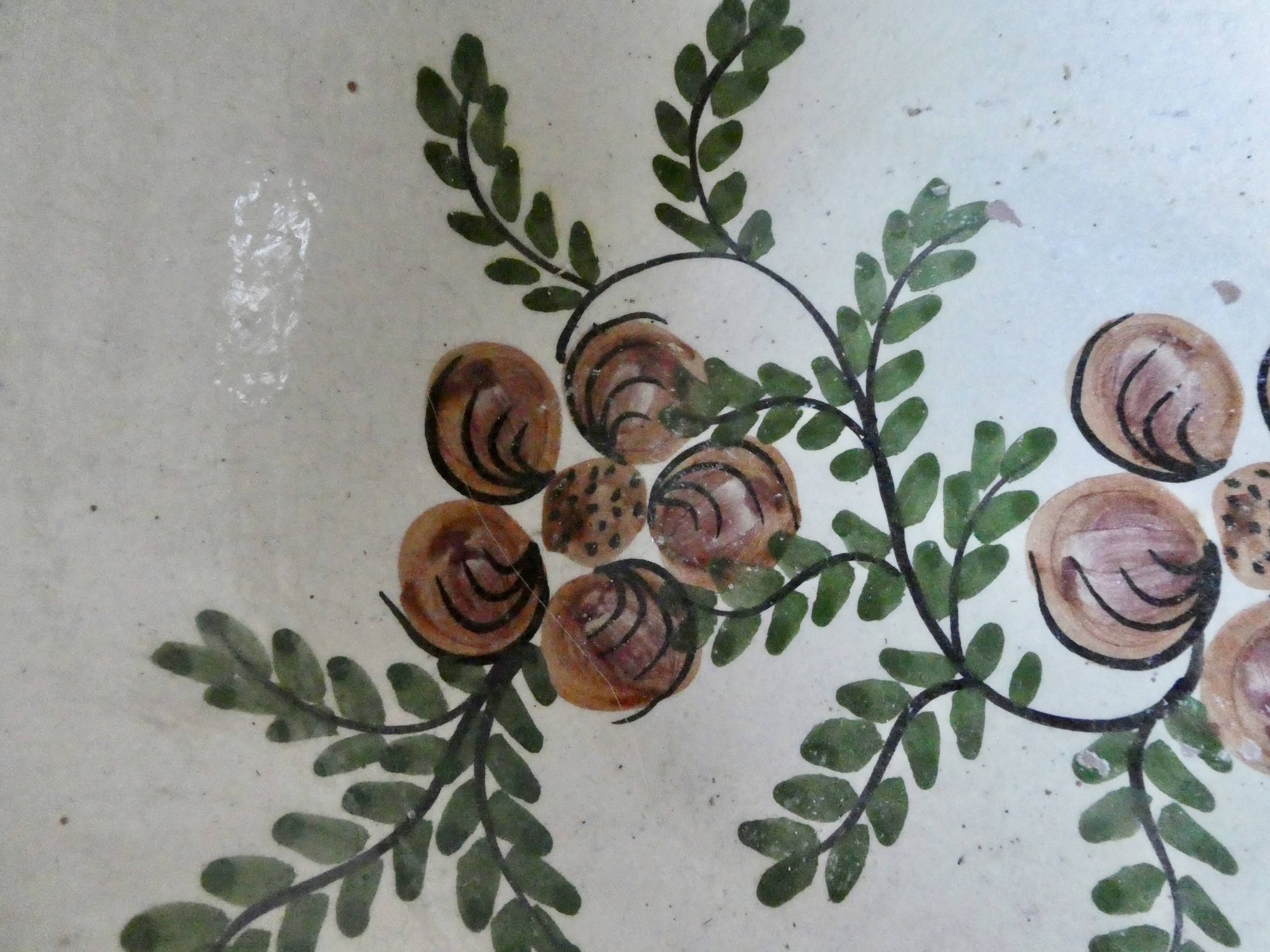 Hollow plate in enamelled terracotta