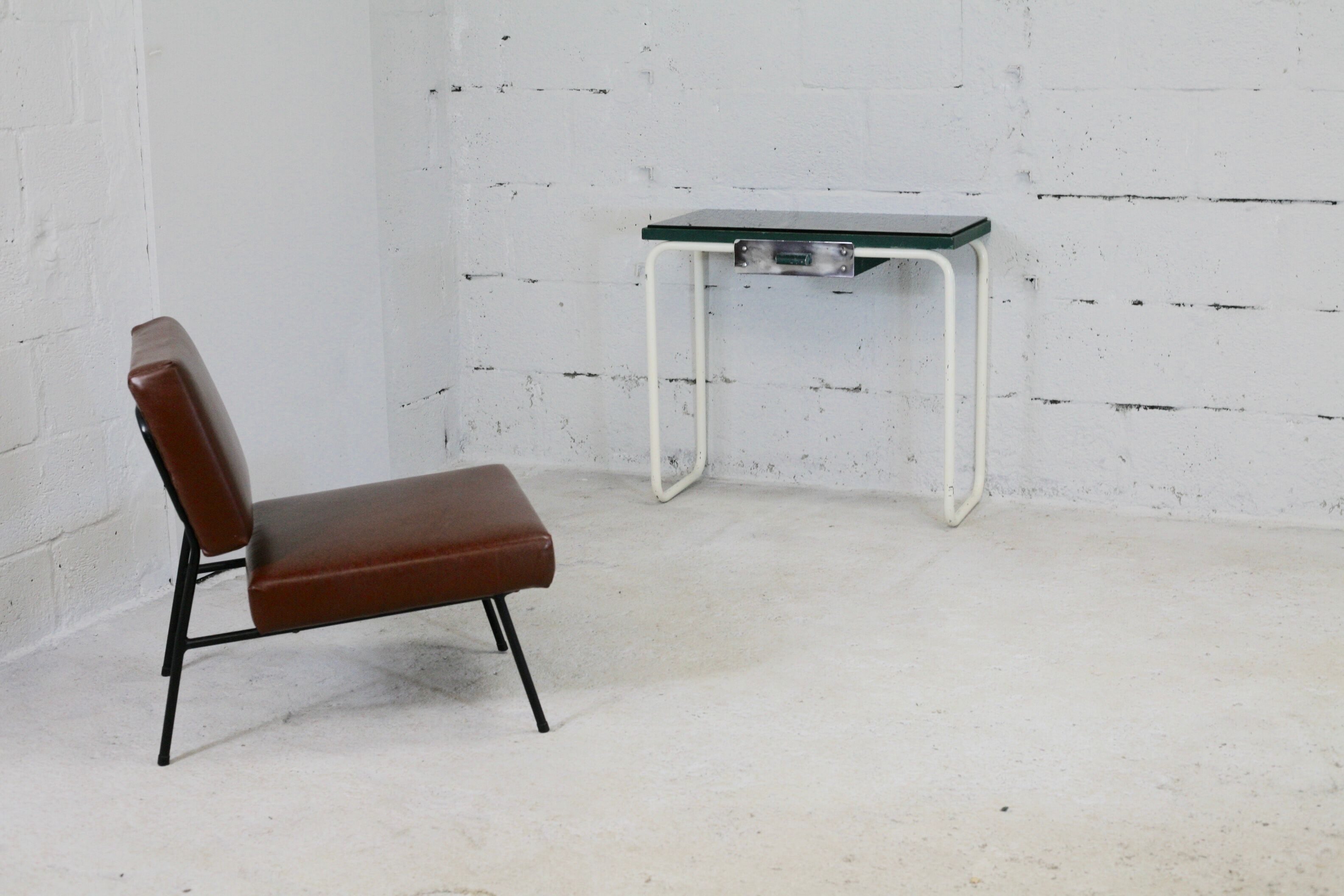 Tubular steel console, black glass tray, circa 1950