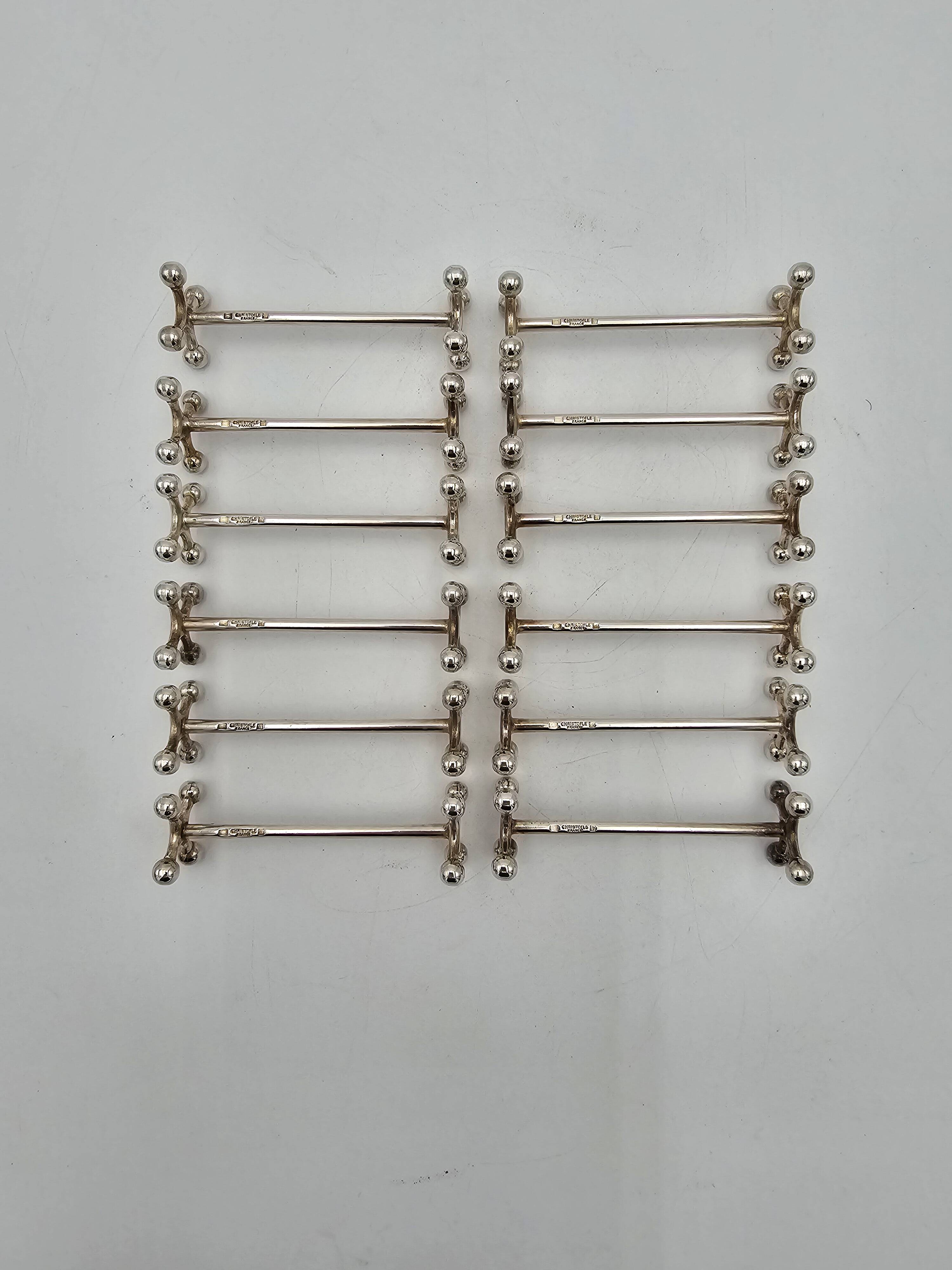 12 Christofle silver-plated knife holders