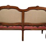 Louis XV style bench upholstered with petit point tapestry, early 19th century