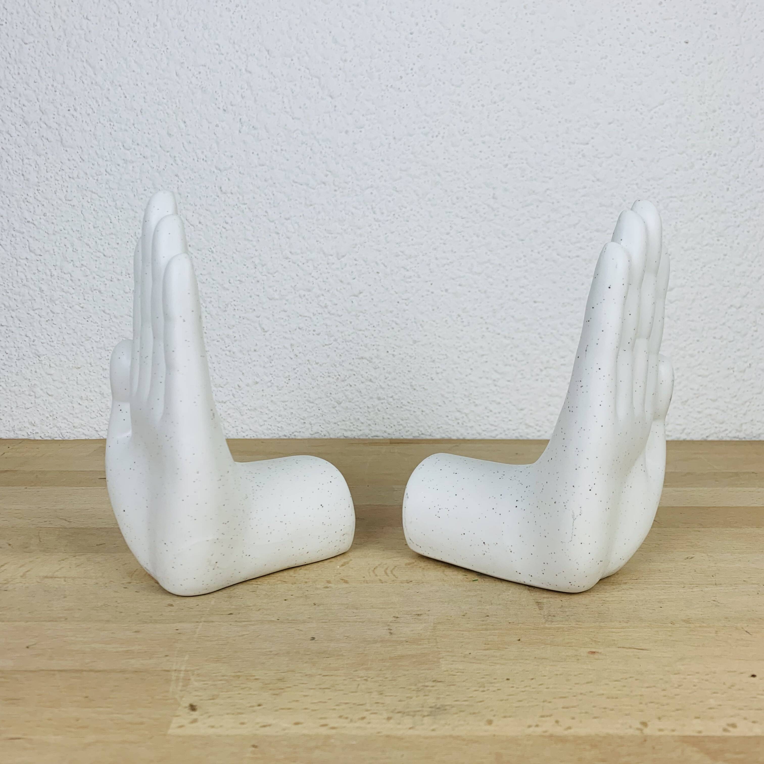 Pair of white ceramic hand bookends