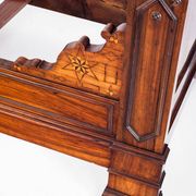 Bed made of solid walnut with marquetry details. France, 1930s.