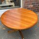 Extendable round table in teak from the 60s with two extensions
