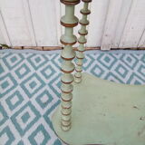 Shelf coils monogrammed patinated wood