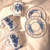 Three cups and two saucers made of Gzhel porcelain.
