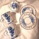 Three cups and two saucers made of Gzhel porcelain.