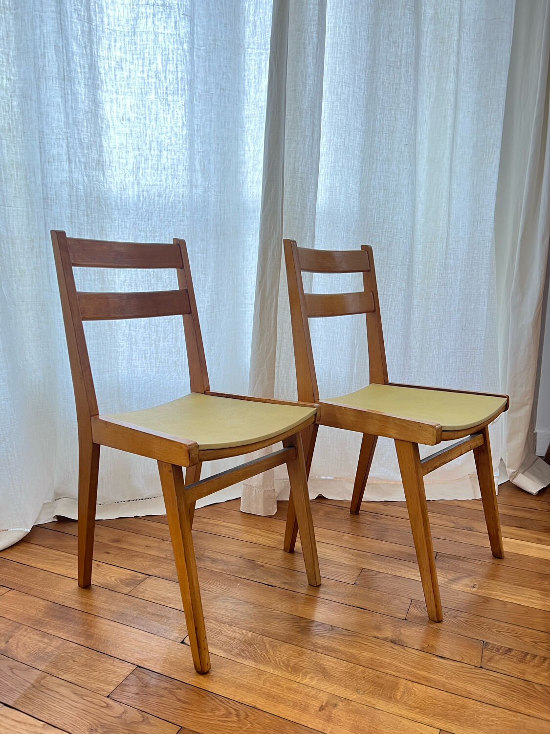 Vintage chairs in wood and skai legs from the 1950s