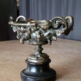 Patinated bronze cup, richly decorated with foliage and bunches of grapes