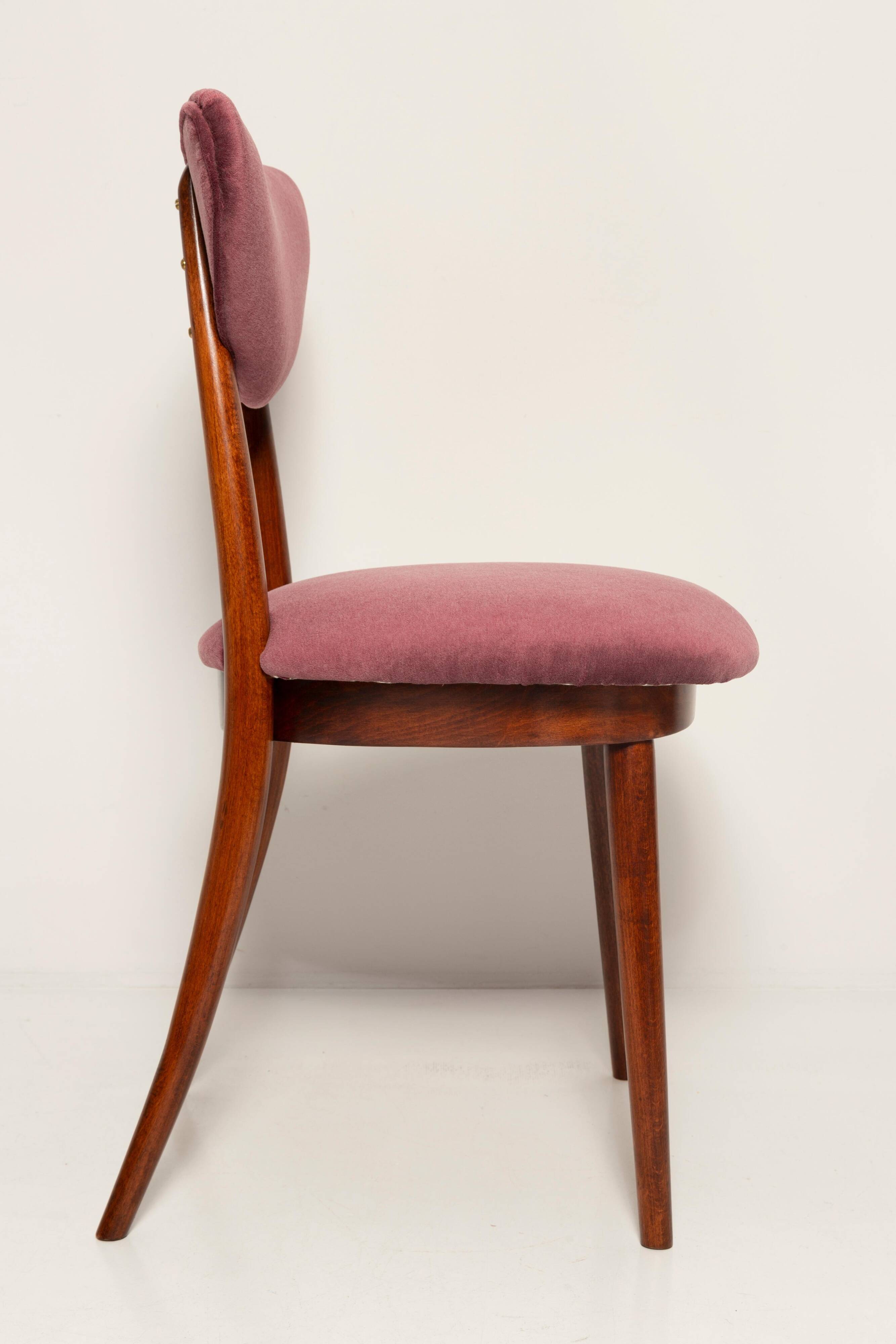 Vintage mid-20th century purple plum velvet heart-shaped chair.