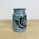 Vintage 1960s ceramic vase, abstract patterns.
