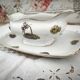 Sauce boat on a Limoges porcelain base with a hydrangea basket design.