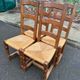 4 dining chairs made of solid wood with straw seats, farmhouse style, medium oak, 20th century, 110cm.