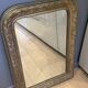 Golden mirror with mouldings